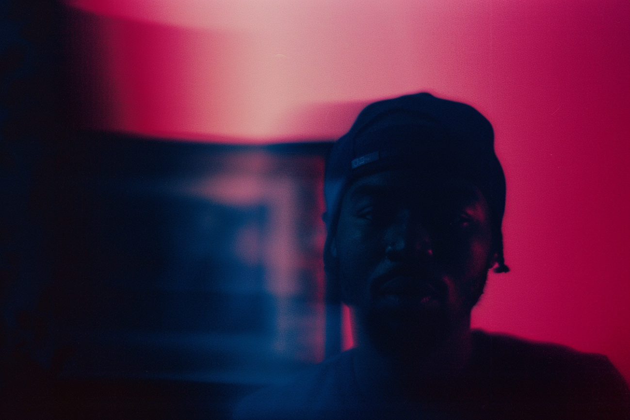 experimental portrait of hip hop artist, red and blue tones